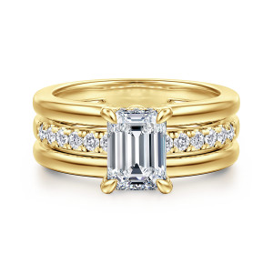 Gabriel & Co. ER16686E6Y44JJ 14 karat yellow gold Contemporary engagement ring, front view of an emerald cut center above a middle lane of round diamonds between two smooth rails