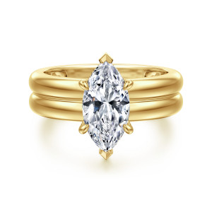Gabriel & Co. ER16687M6Y44JJ 14 karat yellow gold Bujukan engagement ring, front view of a marquise center with a pointed prong at each end on a wide grooved band