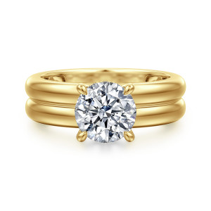 Gabriel & Co. ER16687R6Y44JJ 14 karat yellow gold Bujukan engagement ring, front view of a round center in prongs above a wide band split by a groove