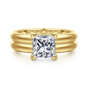Gabriel & Co. ER16687S6Y44JJ 14 karat yellow gold Bujukan engagement ring, front view of a princess cut center on a wide band with a groove along its middle