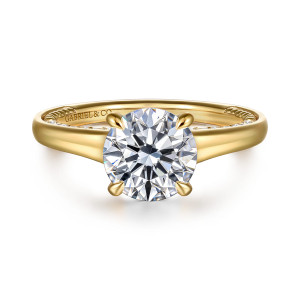 Gabriel & Co. ER16691R8Y44JJ 14 karat yellow gold Classic engagement ring, front view of a round center on four prongs above smooth shoulders with a rope texture inside