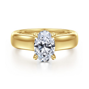 Gabriel & Co. ER16692O6Y44JJ 14 karat yellow gold Bujukan engagement ring, front view of an oval center in four slim claw prongs on a wide smooth band