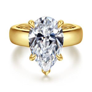 Gabriel & Co. ER16692P20Y44JJ 14 karat yellow gold Bujukan engagement ring, front view of a pear shaped center with rounded prongs and a pointed tip on a broad band