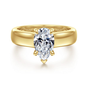 Gabriel & Co. ER16692P6Y44JJ 14 karat yellow gold Bujukan engagement ring, front view of a pear shaped center with a V tip at its point over a wide band