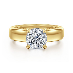 Gabriel & Co. ER16692R6Y44JJ 14 karat yellow gold Bujukan engagement ring, front view of a round center in four slender prongs on a broad polished band
