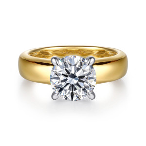 Gabriel & Co. ER16692R8M44JJ 14 karat white and yellow gold Bujukan engagement ring, front view of a round center on four slim prongs over a wide polished band