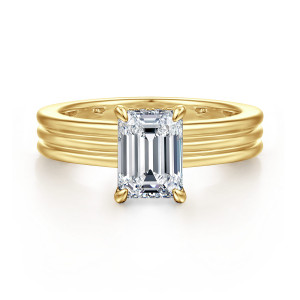 Gabriel & Co. ER16695E6Y44JJ 14 karat yellow gold Contemporary engagement ring, front view of the emerald cut center in four claw prongs above three rounded ribs of the band