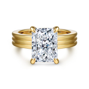 Gabriel & Co. ER16695N16Y44JJ 14 karat yellow gold Contemporary engagement ring, front view of the radiant cut center in corner prongs above a broad ribbed band