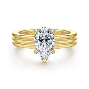 Gabriel & Co. ER16695P6Y44JJ 14 karat yellow gold Contemporary engagement ring, front view of a pear shaped center on a broad band divided into parallel ridges
