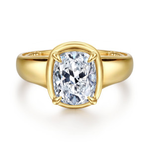 Gabriel & Co. ER16697G12Y44JJ 14 karat yellow gold Contemporary engagement ring, front view of an elongated cushion center inside a smooth rounded metal frame with claw prongs