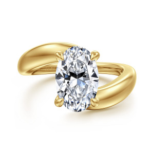 Gabriel & Co. ER16698O10Y4JJJ 14 karat yellow gold Contemporary engagement ring, front view of an oval center in rounded prongs between two smooth band ends passing each other