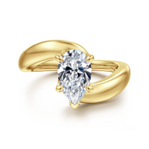 Gabriel & Co. ER16698P6Y4JJJ 14 karat yellow gold Contemporary engagement ring, front view of a pear shaped center above two thick band ends passing each other