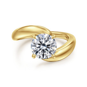 Gabriel & Co. ER16698R6Y4JJJ 14 karat yellow gold Contemporary engagement ring, front view of a round center in four claw prongs above the overlapping ends of the band