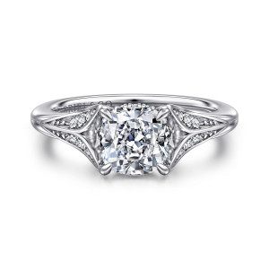 Gabriel & Co. ER16704C6W44JJ 14 karat white gold Contemporary engagement ring, front view of a cushion center between tapering leaf shaped arms set with small diamonds
