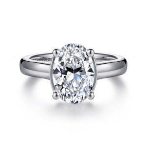 Gabriel & Co. ER16707O8W44JJ 14 karat white gold Contemporary engagement ring, front view of an oval center held by four ball tipped prongs over a smooth plain band