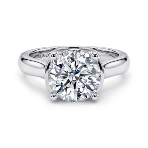 Gabriel & Co. ER16707R12W44JJ 14 karat white gold Contemporary engagement ring, front view of a large round center gripped by four ball tipped prongs on a smooth band