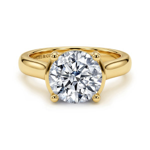 Gabriel & Co. ER16707R12Y44JJ 14 karat yellow gold Contemporary engagement ring, front view of a round center held by four ball tipped prongs over a tapered band