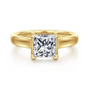 Gabriel & Co. ER16707S6Y44JJ 14 karat yellow gold Contemporary engagement ring, front view of a princess cut center held at its four corners by square topped brackets