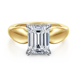 Gabriel & Co. ER16709E12M44JJ 14 karat white and yellow gold Contemporary engagement ring, front view of an emerald cut center between broad rounded shoulders with no stones showing around it