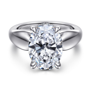 Gabriel & Co. ER16709O19W44JJ 14 karat white gold Contemporary engagement ring, front view of an oval center with rounded prongs above a wide band that swells at the shoulders