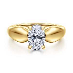 Gabriel & Co. ER16709O6Y44JJ 14 karat yellow gold Contemporary engagement ring, front view of the oval center between two broad smooth shoulders that curve up to the head