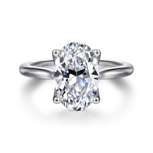 Gabriel & Co. ER16712O12W4JJJ 14 karat white gold Lotus engagement ring, front view of an oval center on four rounded prongs above a smooth tapering band