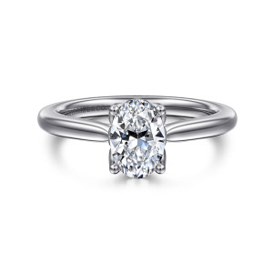 Gabriel & Co. ER16712O4W4JJJ 14 karat white gold Lotus engagement ring, front view of an oval center on ball tipped prongs above a smooth tapering band