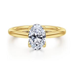 Gabriel & Co. ER16712O6Y4JJJ 14 karat yellow gold Lotus engagement ring, front view of an oval center held by four ball tipped prongs on a smooth tapering band