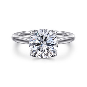Gabriel & Co. ER16712R12W4JJJ 14 karat white gold Lotus engagement ring, front view of a round center gripped by four ball tipped prongs on a plain band