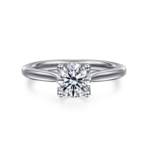 Gabriel & Co. ER16712R4W4JJJ 14 karat white gold Lotus engagement ring, front view of a round center held by four ball tipped prongs on a smooth tapering band