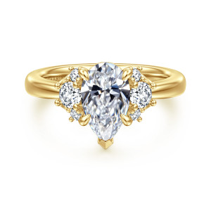 Gabriel & Co. ER16714P6Y44JJ 14 karat yellow gold Lotus engagement ring, front view of a pear shaped center with a V shaped tip prong and round stone clusters