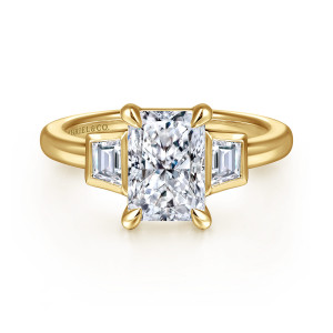 Gabriel & Co. ER16715N8Y43JJ 14 karat yellow gold Contemporary engagement ring, front view of an upright radiant cut center between two bezel set trapezoid diamonds