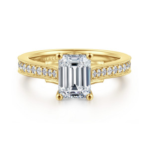 Gabriel & Co. ER16720E6Y44JJ 14 karat yellow gold Lotus engagement ring, front view of an emerald cut center with ball tipped prongs and beaded borders along the shoulders