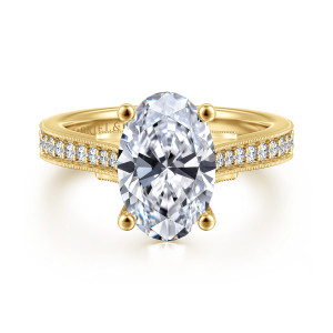 Gabriel & Co. ER16720O12Y44JJ 14 karat yellow gold Lotus engagement ring, front view of an oval center on ball tipped prongs with beaded edged shoulder stones