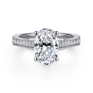 Gabriel & Co. ER16720O8W44JJ 14 karat white gold Lotus engagement ring, front view of an oval center held by four round tipped prongs above beaded edged shoulders