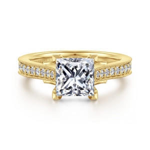Gabriel & Co. ER16720S6Y44JJ 14 karat yellow gold Lotus engagement ring, front view of a princess cut center between two beaded shoulders lined with small diamonds