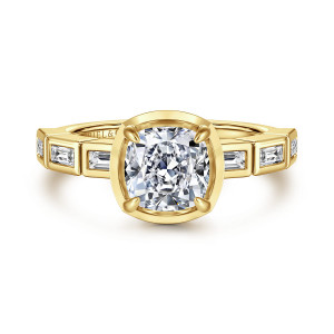 Gabriel & Co. ER16722C6Y43JJ 14 karat yellow gold Contemporary engagement ring, front view of the cushion center inside a raised rim with baguette bezels at each shoulder