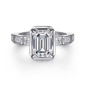 Gabriel & Co. ER16722E8W43JJ 14 karat white gold Contemporary engagement ring, front view of an emerald cut center with corner prongs and a squared collar above baguette bezels