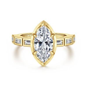 Gabriel & Co. ER16722M6Y43JJ 14 karat yellow gold Contemporary engagement ring, front view of a marquise center inside a pointed rim above bezel set baguettes