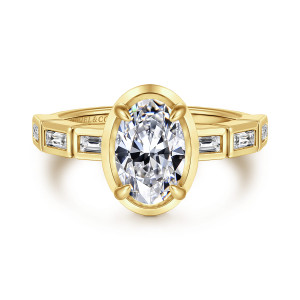 Gabriel & Co. ER16722O6Y43JJ 14 karat yellow gold Contemporary engagement ring, front view of an oval center in a flat rim with boxed baguette stones on both shoulders