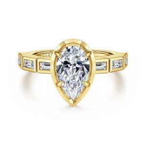 Gabriel & Co. ER16722P6Y43JJ 14 karat yellow gold Contemporary engagement ring, front view of a pear shaped center in a pointed frame with baguette bezels on the shoulders