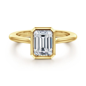 Gabriel & Co. ER16728E6Y4JJJ 14 karat yellow gold Contemporary engagement ring, front view of the emerald cut center inside a smooth frame with angled corners and no prongs