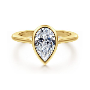 Gabriel & Co. ER16728P6Y4JJJ 14 karat yellow gold Contemporary engagement ring, front view of a smooth bezel outlining a pear shaped center that ends in a point