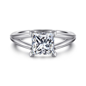 Gabriel & Co. ER16730S6W4JJJ 14 karat white gold Contemporary engagement ring, front view of a princess cut center in squared corner prongs with the split arms curving away