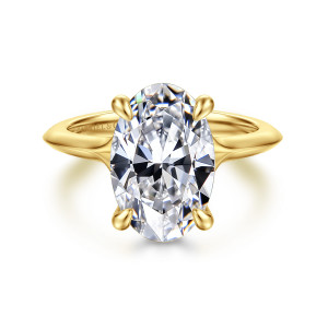 Gabriel & Co. ER16734O16Y44JJ 14 karat yellow gold Contemporary engagement ring, front view of an oval center on a band with sharp ridged shoulders and no stones on top