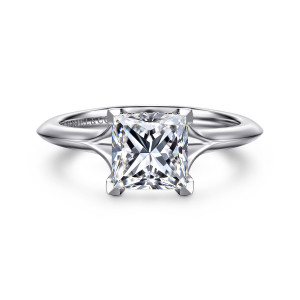 Gabriel & Co. ER16734S6W44JJ 14 karat white gold Contemporary engagement ring, front view of the princess cut center with angular corner prongs and shoulders that flare outward