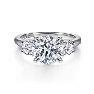 Gabriel & Co. ER16737R8W44JJ 14 karat white gold Classic engagement ring, front view of a round center flanked by two round side stones, each in its own small prongs