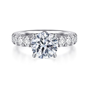 Gabriel & Co. ER16739R8W44JJ 14 karat white gold Contemporary engagement ring, front view of a round center with round diamonds in shared prongs on each shoulder