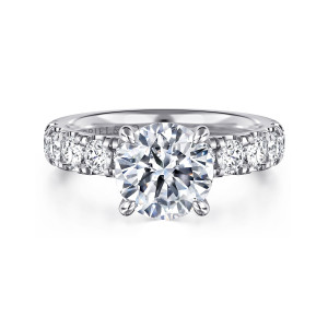 Gabriel & Co. ER16740R8W44JJ 14 karat white gold Contemporary engagement ring, front view of a round center flanked by a row of large diamonds down each shoulder