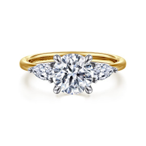 Gabriel & Co. ER16743R6M44JJ 14 karat white and yellow gold Classic engagement ring, front view of a round center with an elongated side stone pointing outward on each side